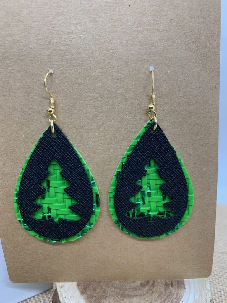 diy Christmas tree faux leather earrings made on a Cricut machine