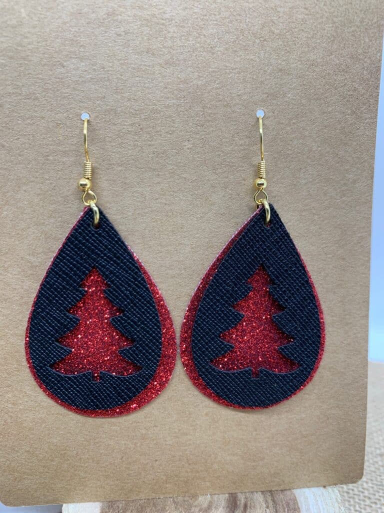 diy Christmas tree faux leather earrings made on a Cricut machine