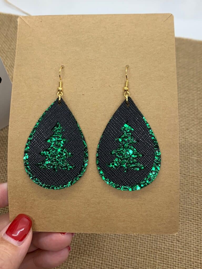 diy Christmas tree faux leather earrings made on a Cricut machine
