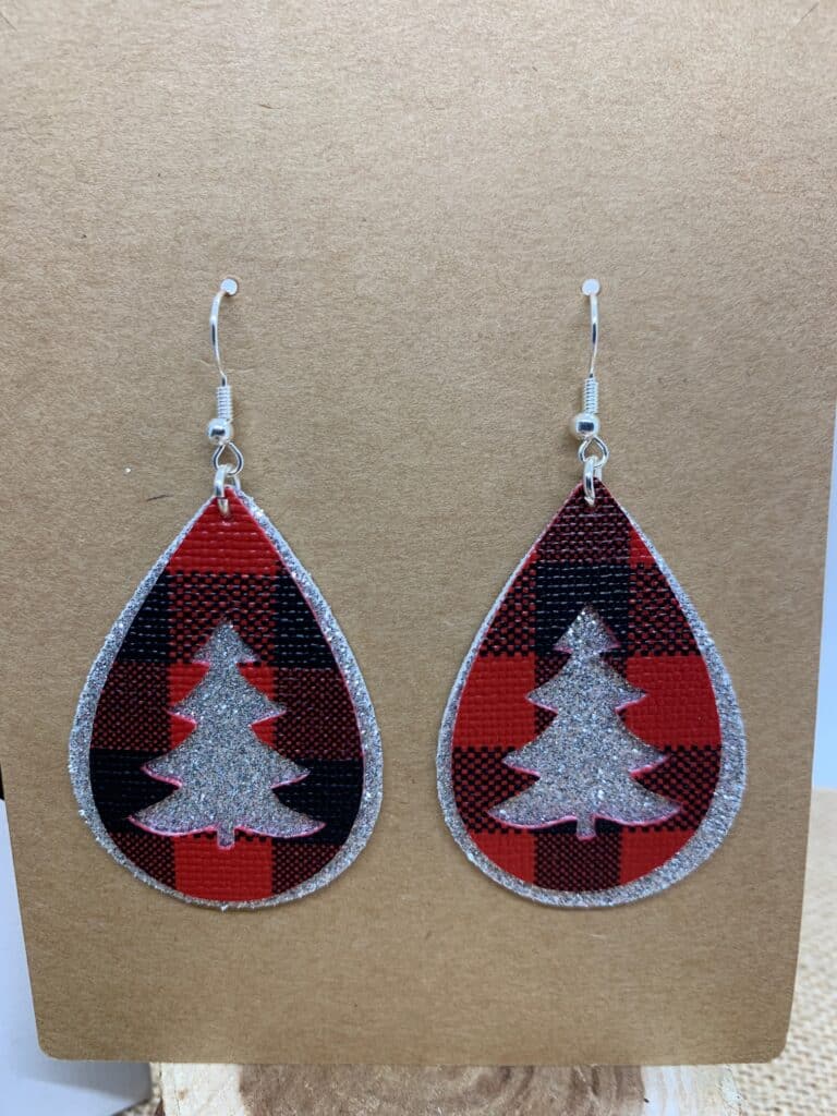 diy Christmas tree faux leather earrings made on a Cricut machine