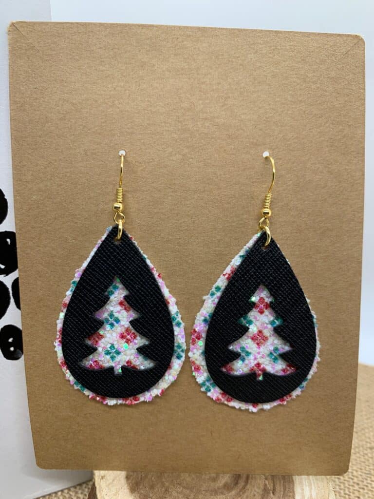 diy Christmas tree faux leather earrings made on a Cricut machine