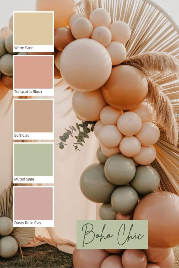 A boho chic baby shower backdrop featuring soft neutral balloons in warm sand, terracotta blush, soft clay, muted sage, and dusty rose, styled with pampas grass, rattan textures, and dried floral accents. A coordinating color palette appears beside the display.